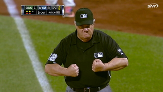 Umpire Takes A Foul Ball To The Chest, Flexes